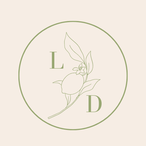 Monogrammed L and D logo with lemon at the center